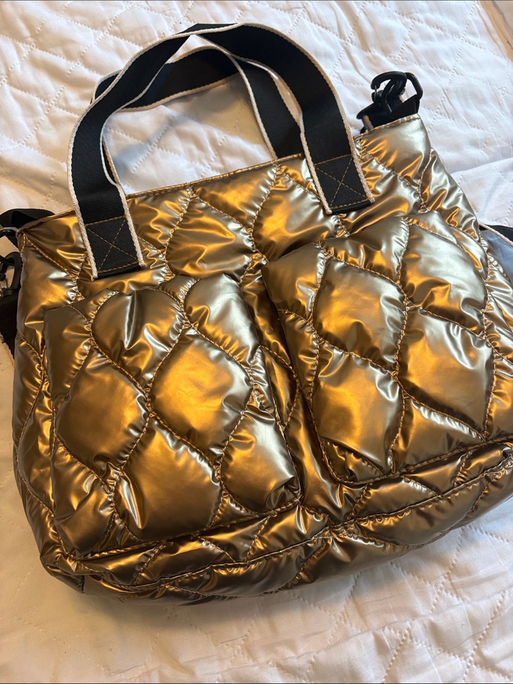 Gold puffy handbag